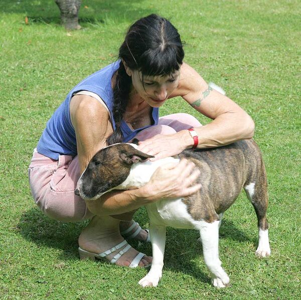 Gucci Receiving A Cuddle from Marjorie